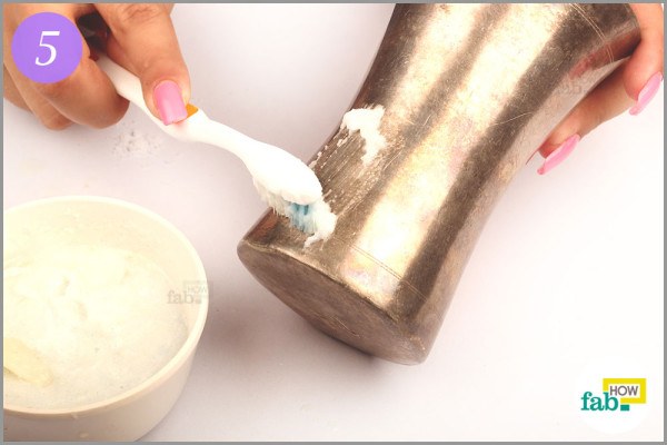 Apply paste on silver using toothbrush