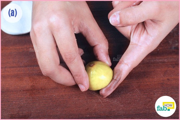 Rub half lemon over stained skin