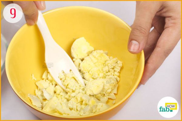 Mash the yolks with fork