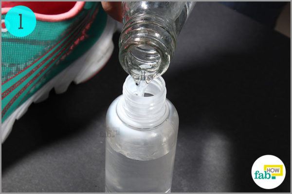Make a 50% white vinegar solution