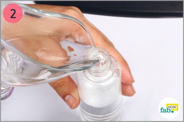 Fill the spray bottle with distilled water