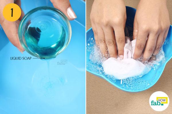 Wash the fabric in soapy water