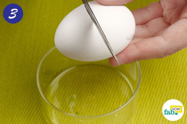 Break an egg into a small bowl
