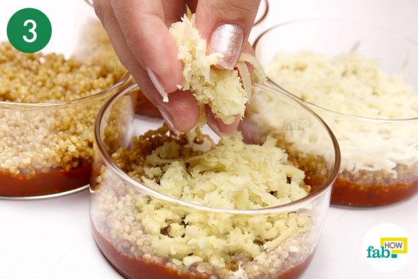 Cover the quinoa with cheese