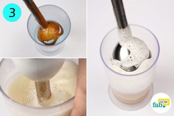Immerse the hand blender into the soapy mix and blend