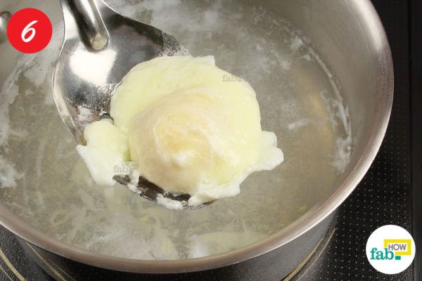 Remove the egg using a slotted spoon