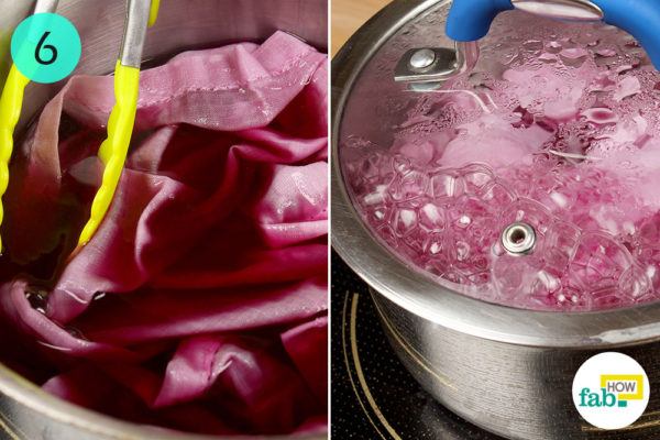 Transfer the cloth into a saucepan filled with dye