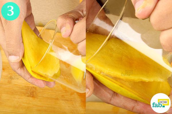 Slide the mango through the glass