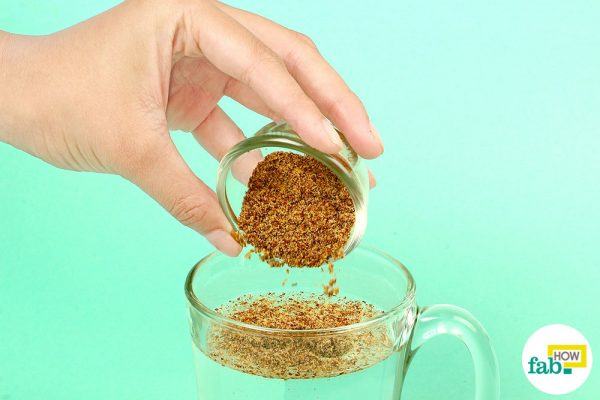 Add ground flaxseeds to water