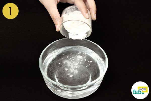 combine baking soda and water
