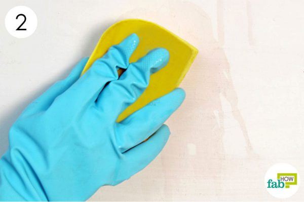 scrub the stain with sponge