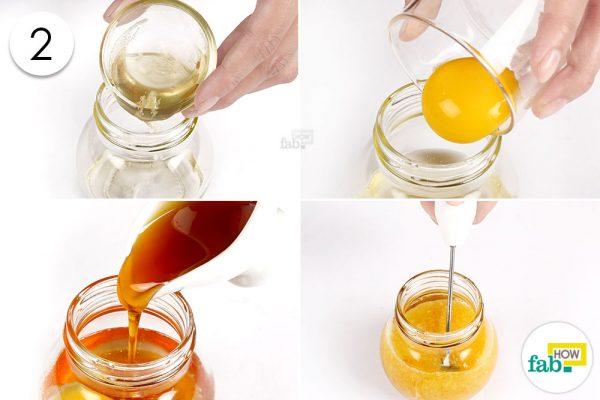 add coconut oil, egg yolk and honey together for dry damaged and frizzy hair