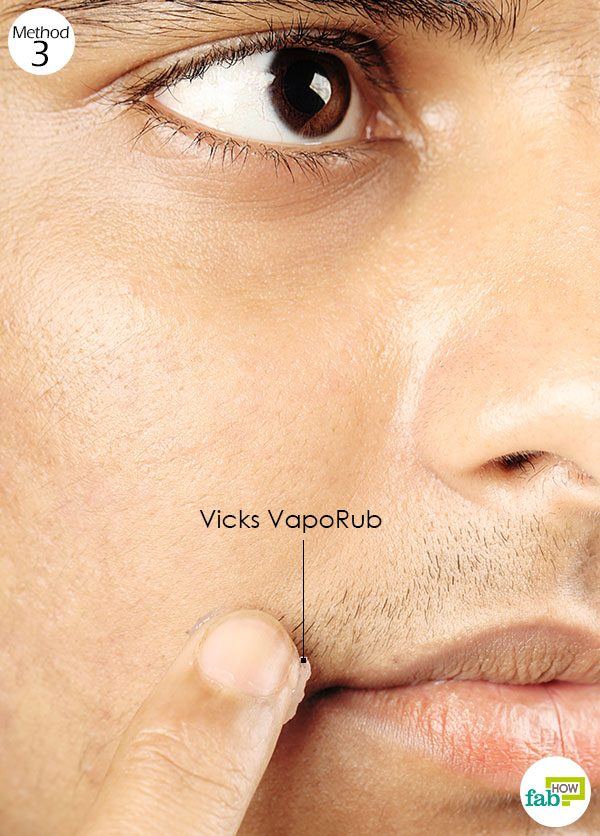 apply vicks vaporub to the cold sore to relieve discomfort
