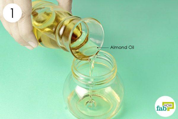pour almond oil in a container