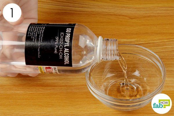 pour rubbing alcohol in a bowl