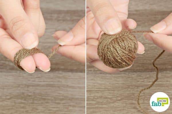 Continue to wrap a wool yarn to form a ball for dryer ball laundry hach