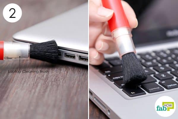 Use a laptop brush to clear out dust and debris to clean your MacBook