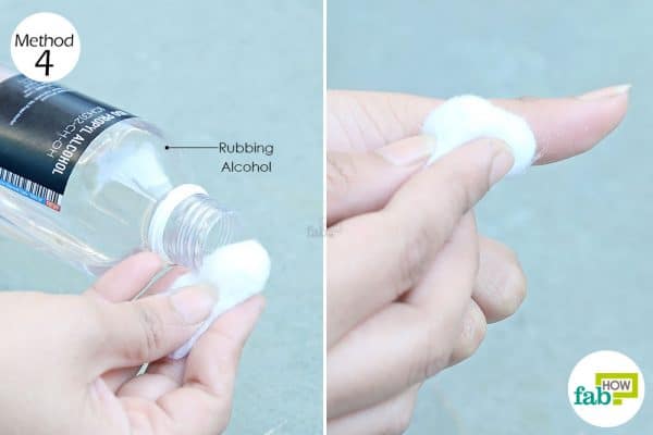 Rub rubbing alcohol to remove super glue from skin