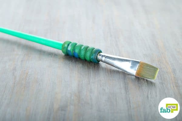 use liquid dish soap to clean paintbrushes