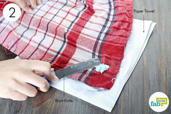 scrape it off with knifeto remove chewing gum from clothes