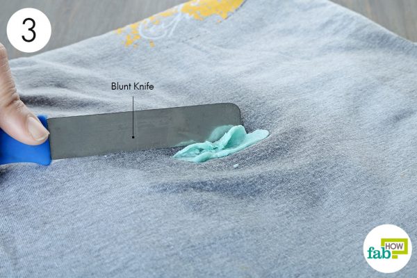scrape the gum off to remove chewing gum from clothes