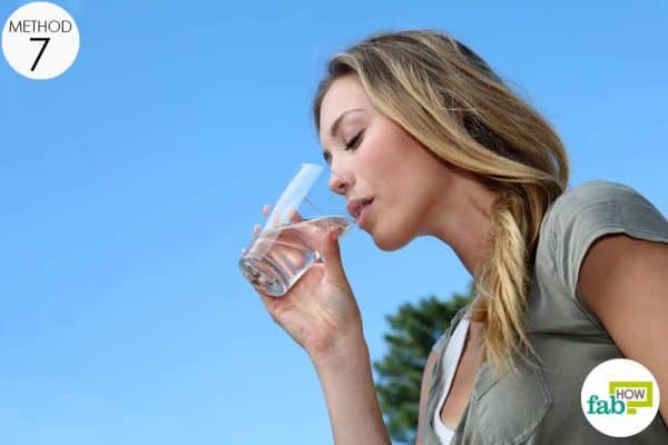 drink lots of water and other healthy drinks to remove white spots on teeth